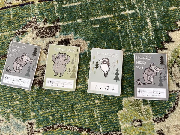 four cards on Bethany's studio carpet