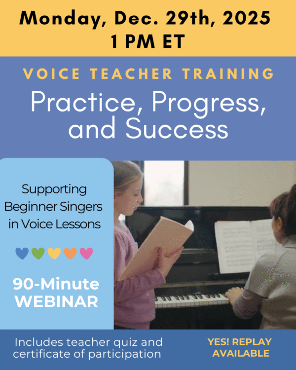 A young girl singing at the piano