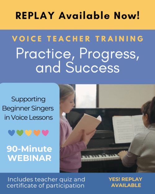 A young girl singing beside the piano
