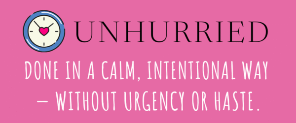 Definition of unhurried, done in a calm, intentional way without urgency or haste.