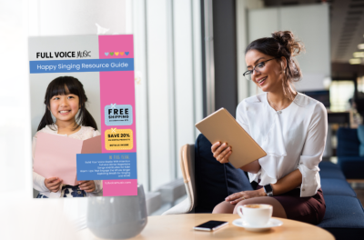 a teacher reading her tablet and enjoying a coffee beside image of the catalogue