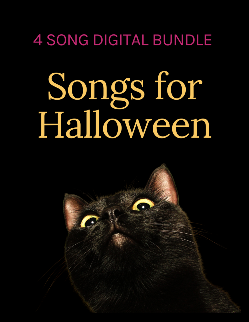 4 song digital bundle, Songs for Halloween. A black cat on a black background with yellow eyes